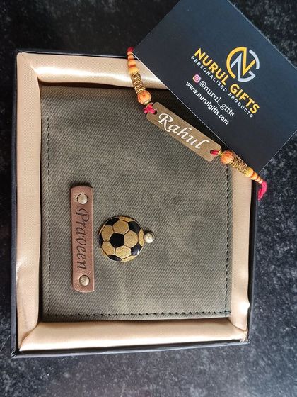 A special Rakhi gift set with a personalized denim wallet and a custom name Rakhi, ready to be gifted.