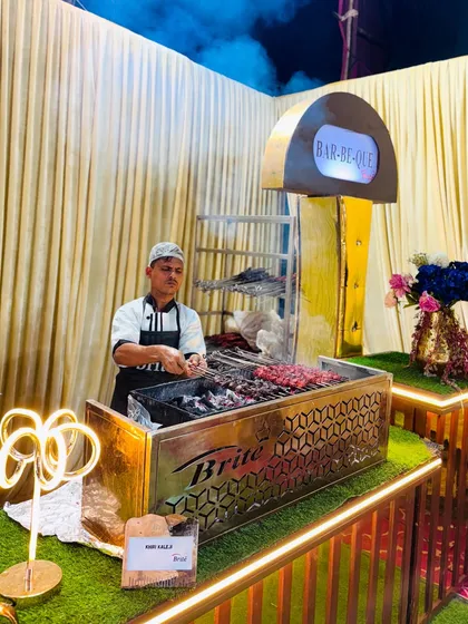 My dedicated barbecue counter, stylishly designed with a custom "Bar-Be-Que" sign and neon lighting, creating a modern yet authentic vibe.