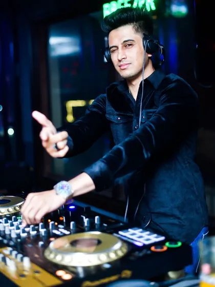 Behind the decks is where my productions come to life. I create custom mashups and remixes so that every set I play has an exclusive flavor, ensuring the energy never drops.