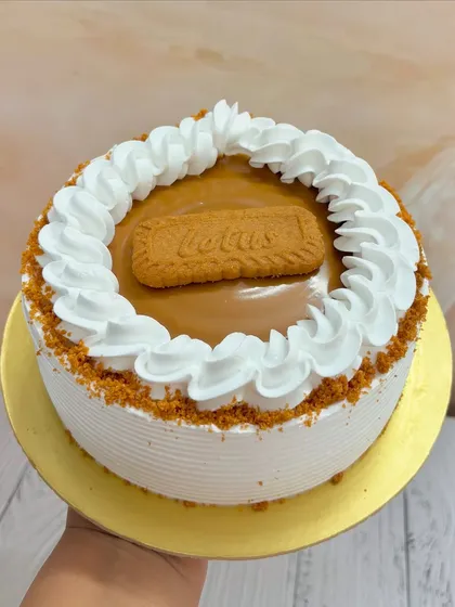 Another angle of the irresistible Biscoff cheesecake, showing off its creamy topping and crumbly base.