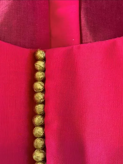 Another look at the details. These potli buttons are just one example of the custom finishes I can provide for your garment production line.