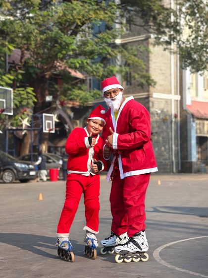 Two Santas are better than one. A coach and student get into the festive spirit during our Christmas event.