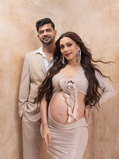 A confident and stylish portrait of the expecting couple. I work with each couple to find poses that reflect their personality.