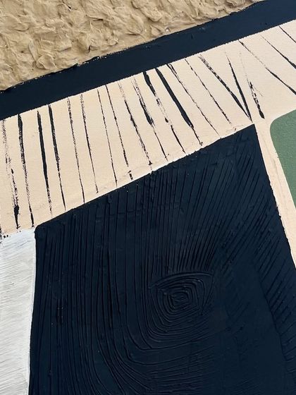 A detail shot showing the different textures, including the rough surface created from the egg carton pulp. I love experimenting with unconventional materials in my art.