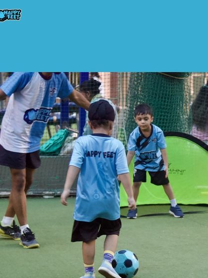 With a little guidance from our coach, this young player is learning the right stance for kicking. We focus on these small details to help kids build good habits from the very beginning of their football training.