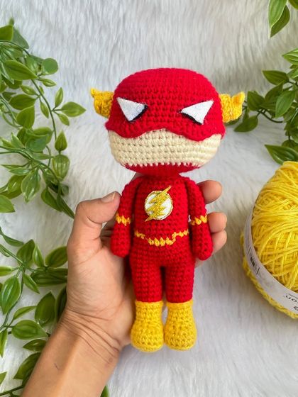 The Flash! This superhero doll was made with a special head shape as requested by the customer. I love getting the details right, like the lightning bolt emblem on his chest.