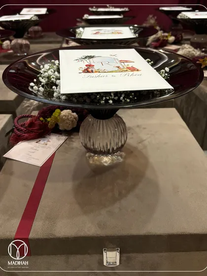 A clean, focused shot of the Crimson Crystal Bowl as a wedding favor. The elegant design and rich color make it a sophisticated token of appreciation for guests.