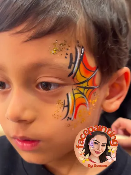 A spiderweb design with a fiery background. It's a cool and spooky choice, perfect for Halloween or a superhero fan.