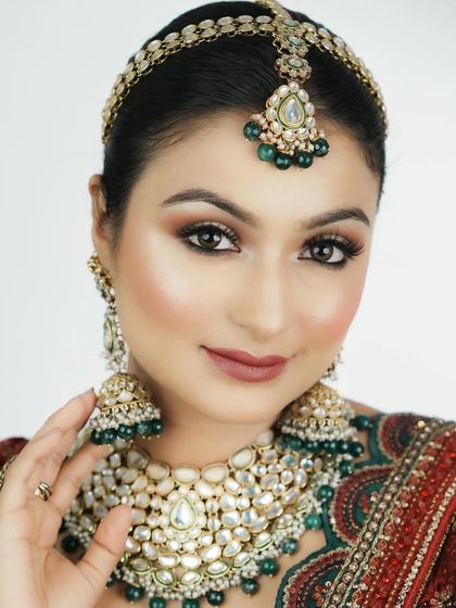 A close-up view highlighting the flawless skin texture and soft contour. My curriculum emphasizes skin preparation as the foundation for any stunning makeup look.