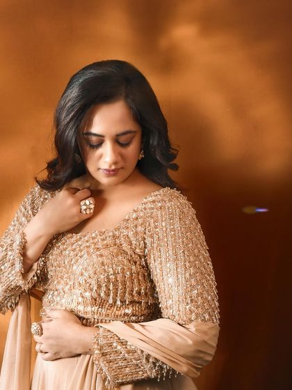 A detailed shot focusing on the craftsmanship of the embellished top and the elegant jewellery pairing for Spruha Varad's awards night.