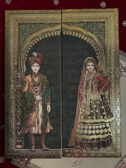 I designed this card with a gate-fold opening that reveals the bride and groom, framed by an ornate archway reminiscent of a palace entrance.