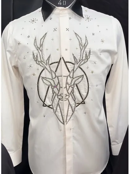 A white designer shirt featuring a geometric stag embroidered in metallic thread. The contrasting black collar adds a sharp, modern touch to this artistic and sophisticated piece.