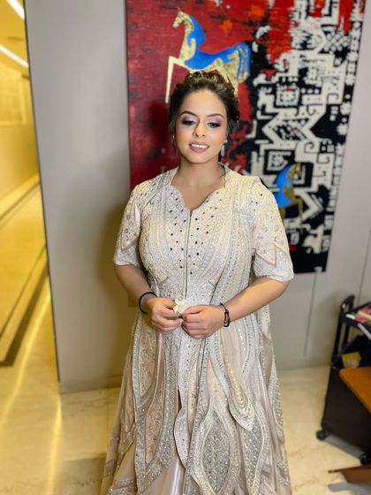 This client looks absolutely radiant and confident, ready for her special event.