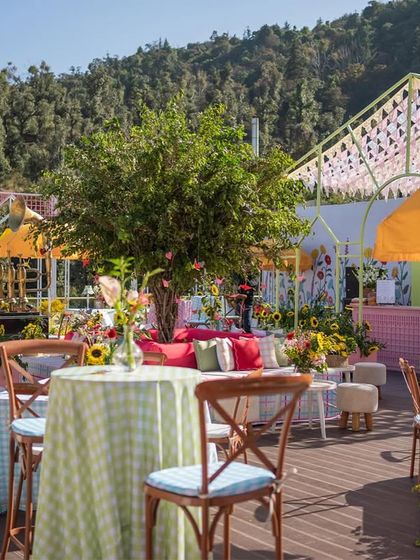 A wide shot of the terrace setup, showing how we used different colors and patterns to create a vibrant and joyful space.