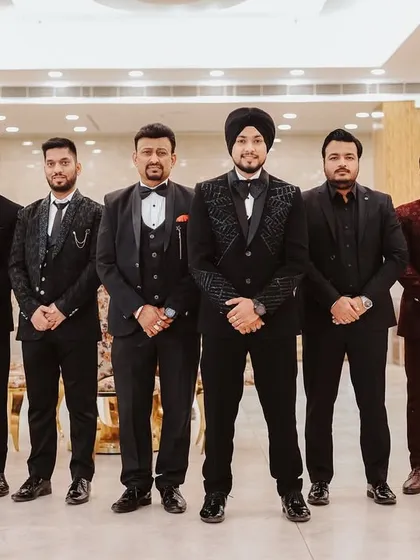 The groom and his groomsmen looking sharp and ready for the ceremony. It's not just about the couple, but also about the friends who stand by their side.