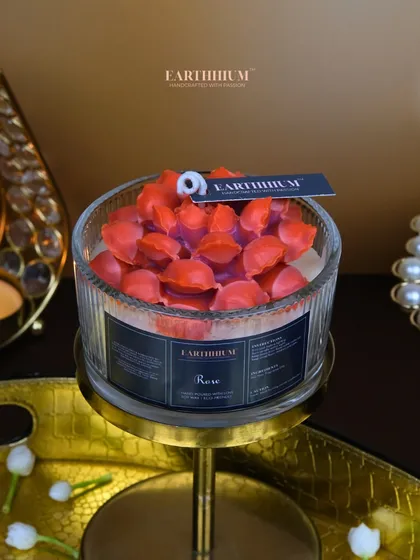 A close-up of the red petal votive candle, showing the intricate detail of each tiny wax petal.
