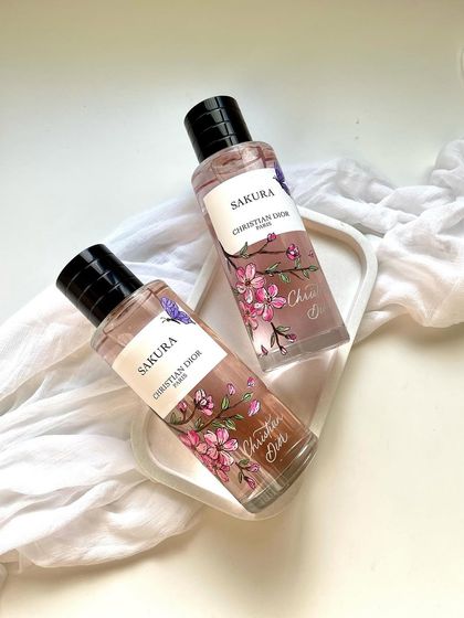 Here are the 'Sakura' fragrance bottles, adorned with hand-painted cherry blossoms. Each design is carefully considered to reflect the essence of the perfume, turning it into a piece of display art.