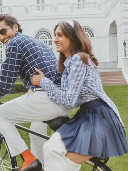 A candid, joyful moment from the S&N by Shantanu Nikhil shoot. The natural-looking hair and makeup were designed to hold up during an active outdoor shoot while looking effortlessly beautiful.