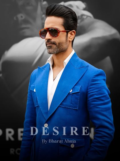 Bold in blue. This portrait shot highlights the rich color and clean lines of the custom summer blazer, designed for fearless confidence.
