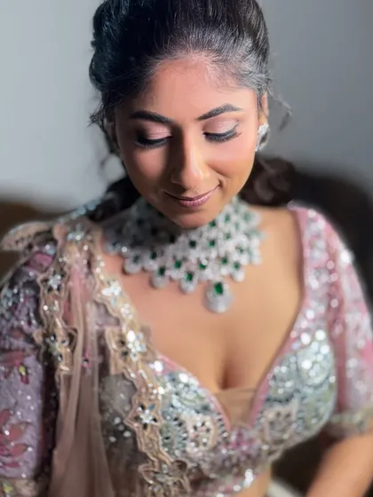 A quiet moment before the reception. Here you can see a close-up of the soft, shimmery eye makeup I created for this client's beautiful pastel lehenga.