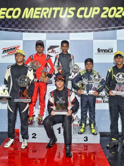 The OK-Junior podium for the Meco Meritus Cup 2024, showcasing the top three drivers in this highly competitive development category.