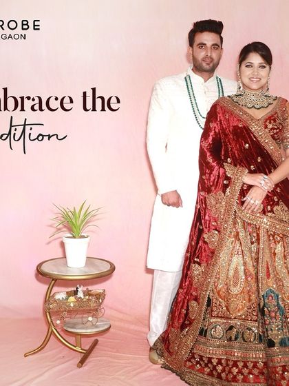 Embrace tradition with a touch of velvet. This bride’s heavily embroidered velvet lehenga and the groom’s classic white sherwani create a look of pure opulence, perfect for a winter wedding.