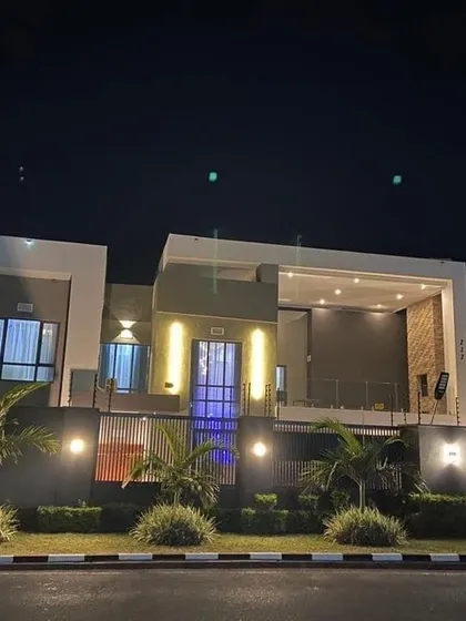 A home's personality shines brightest at night. We use strategic, multi-layered lighting to accentuate the architectural lines, create dramatic shadows, and give the residence a warm, inviting glow that stands out after dark.