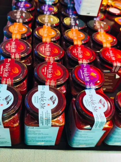 Our stall is always a colourful sight. Here is a look at our non-veg pickles, including the popular squid and prawn varieties, neatly arranged for customers.