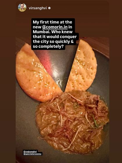 Vir Sanghvi enjoying our Haleem, served with a crisp, sesame-studded bakarkhani. A dish that has won over critics and guests alike.