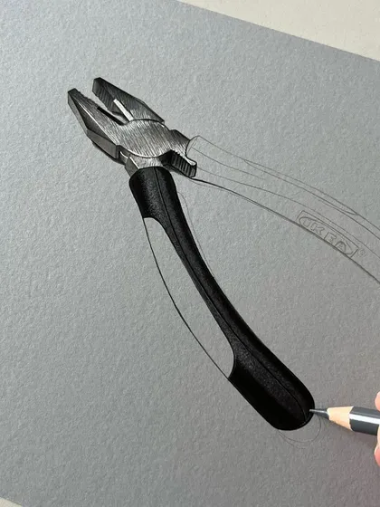 This WIP shot of the plier shows how I build up the form. I'm working on the handle, leaving the metal part as a line drawing for the next stage.