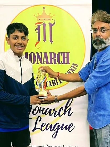 Tanish proudly accepts his trophy for securing the Runner Up position in the U15 category at the 2nd Monarch League tournament.