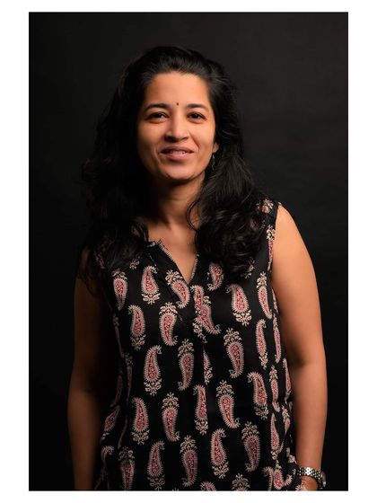 This image from the series shows a slightly more composed smile, offering a different nuance of expression.