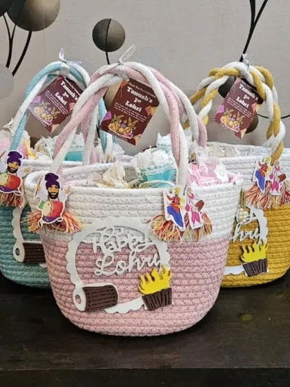 My popular Lohri hamper baskets are available in multiple pastel colors. They are perfect for celebrating a first Lohri and come with personalized tags.