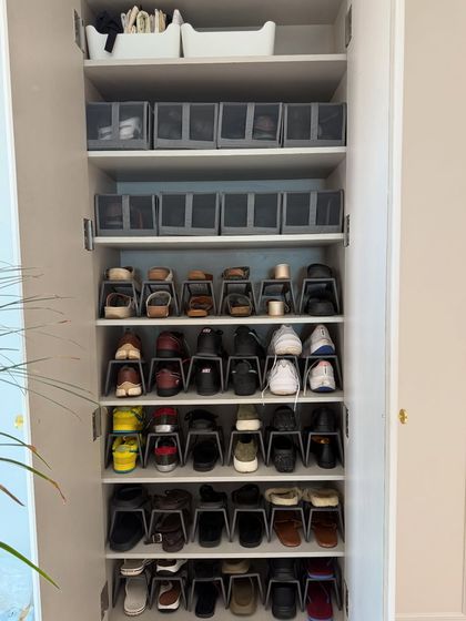 For everyday footwear, function is key. We use shoe stackers and shelf organizers to maximize space and keep every pair visible and tidy. Labeled boxes on top store seasonal or less-used pairs.