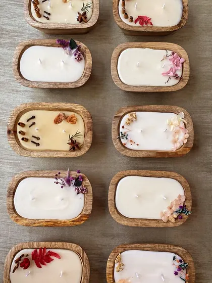 These rustic wooden bowl candles are one of my favorite items to make. Each bowl is filled with 100% soy wax and can be decorated with different botanicals and spices, offering a natural and earthy aesthetic for your home decor.