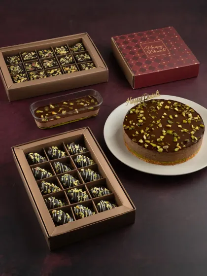 Add a delightful crunch to your Diwali with our new Kunafa Collection. This image shows our Kunafa Crunch Gift Box, Kunafa Dates Gift Box, and the Crème Del-a Crème Kunafa dessert.