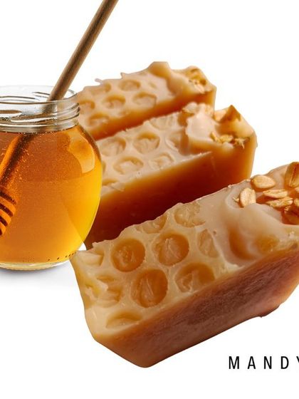 A beautifully styled shot of my Honey Oatmeal soap, featuring its signature honeycomb top. It's packed with ground oatmeal and real honey for gentle, unscented skincare.