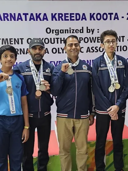 Our shooters and coaches together celebrating multiple victories at the Karnataka Olympic Games.