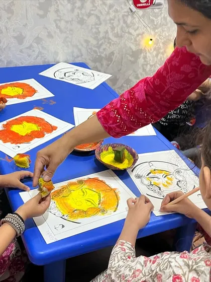 More creative fun at our Navratri workshop. The kids are using sponges to add color and texture to their Durga Maa artwork.