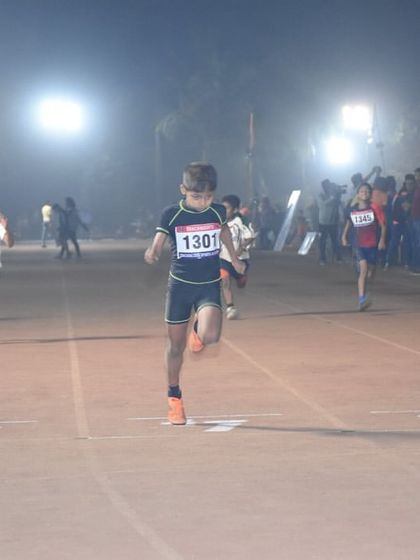 Young athletes give their all at the starting line of a sprint race during TrackNights.