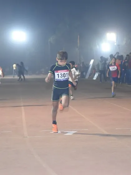 Young athletes give their all at the starting line of a sprint race during TrackNights.