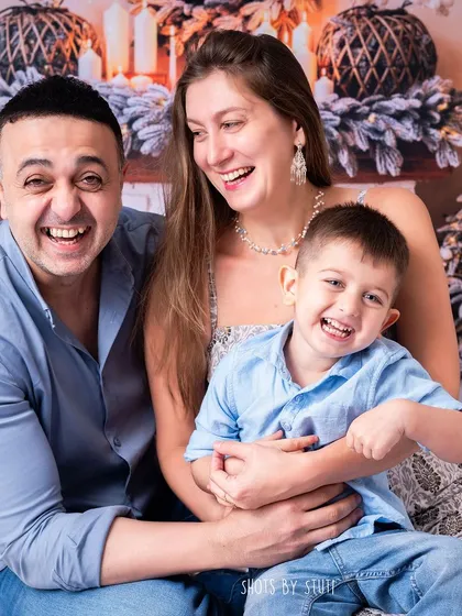 A candid moment of pure laughter. My goal is to create a fun atmosphere where your family can relax and be themselves.