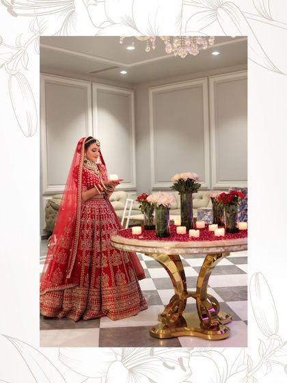 Another elegant shot of the bride with candles, creating a warm and romantic ambiance.