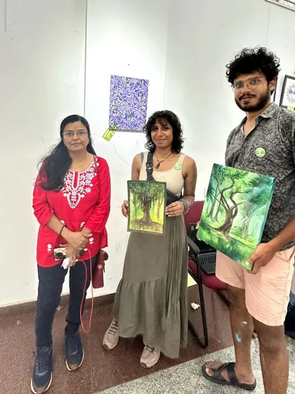 With fellow artists at the exhibition.