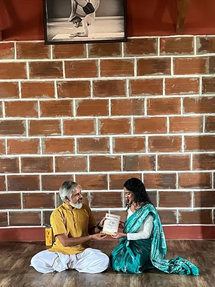 Receiving my certificate from my guru. He taught me that our happiness is within us, and that we must always remember our purpose. These are lessons I carry into every class.