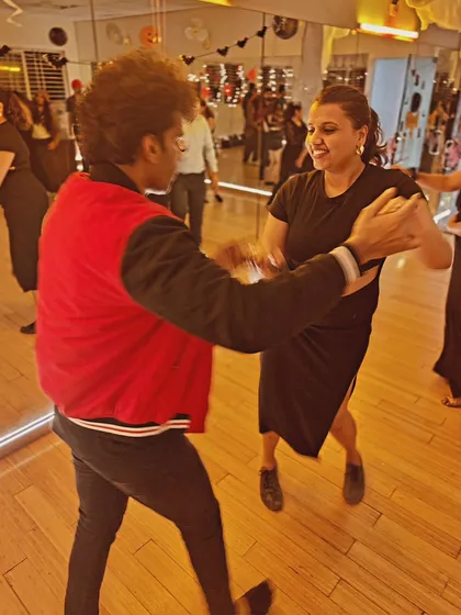 A candid shot of students enjoying a dance during our Halloween party. The studio is filled with good energy and great music.
