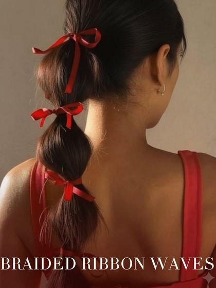 For a more modern and fun festive look, these braided ribbon waves are perfect. Small red bows are tied throughout a bubble braid, adding a pop of color and playful texture.