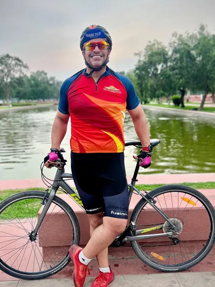 A member looking cheerful and energetic during a ride. The positive atmosphere is one of the best parts of our club.