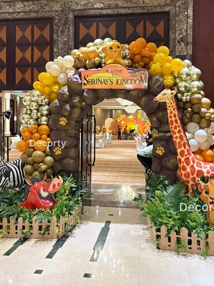 A clear, bright shot of the Lion King themed entrance arch, welcoming everyone to the celebration.