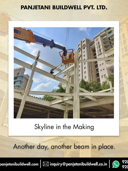 A skyline in the making at the Camex Experience Centre for DLF in Gurugram. Our team uses a crane and lift basket to carefully position and secure steel beams, demonstrating our focus on safety and precision.